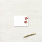 Notes post-it pour les pivoines rouges (Sur un bureau)