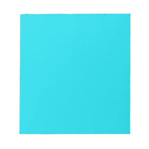 Notitieblok met Blauwgroen blauwe achtergrond van