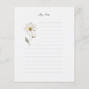 Notitiepapier met geperste bloemen en lijntjes