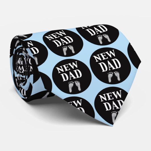 Nouvelles empreintes de pas de bébé de cravate de (Roulé)