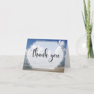 Nuages gras sur la plage Photo avec Merci insigne