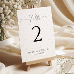 Numéro de la table de Mariage des perles blanches<br><div class="desc">Améliorez vos tables de réception grâce à nos numéros de table de Mariage White Pearls. Avec des images de perles élégantes et un design chic et minimaliste,  ces numéros de table ajoutent une touche de raffinement à votre décor mariage,  assurant à chaque table une élégance intemporelle.</div>