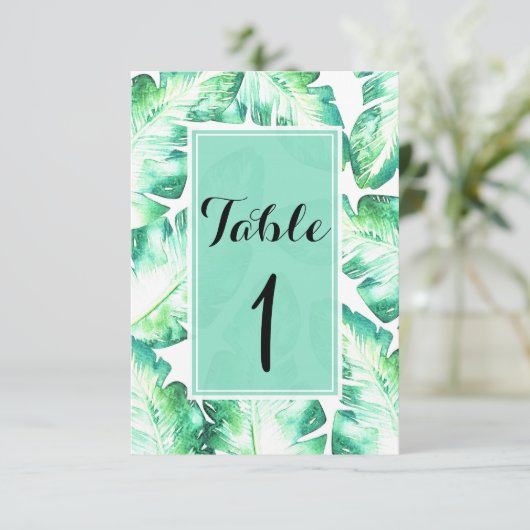 Numéro de table aux feuilles tropicales blanches e (Debout devant)