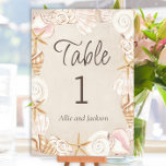 Numéro De Table Beach Seashells Sable Bord De Mer Réception De Mar<br><div class="desc">Réception de mariage en bord de mer couleur sable Carte numéro de table encadrée de superbes coquillages. Personnalisez une carte pour chaque table. Imprimé à l'avant et à l'arrière pour permettre de voir votre numéro des deux côtés. Contactez-moi pour obtenir de l'aide sur vos personnalisations ou pour demander des produits...</div>