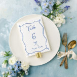 Numéro De Table Bow et rubans Whimsical Mariage bleu français<br><div class="desc">Numéro de table du Mariage Whimsical bleu français,  avec un arc dessiné à la main et un cadre ruban ondulé et une police de style écriture manuscrite. Personnalisez avec des noms.</div>