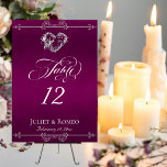 Numéro De Table Calligraphy & Silver Heart - Plum Table Number<br><div class="desc">The design features an elegant plum (purple) background embellished with scroll borders, a heart and placeholders for the table number, couple's names and date of event. Available in several colors for your wedding theme. (Glitter is simulated in the artwork). Designed to coordinate with the Romantic Scroll Hearts & Calligraphy Wedding...</div>