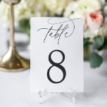 Numéro De Table Cendres noires   blanches | Script simple et éléga<br><div class="desc">Des cartes numériques simples et chic en blanc clair,  classique avec des lettres noires cendres douces font une déclaration élégante à votre mariage ou événement. Le design comprend un script de calligraphie écrit à la main,  avec votre numéro de table en chiffres classiques.</div>