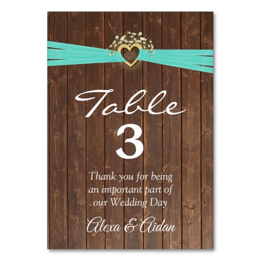 Numéro De Table Coeur d'or avec ruban turquoise sur le bois de la  (Par défaut)