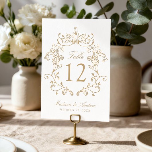 Numéro de table de mariage élégant au blason doré