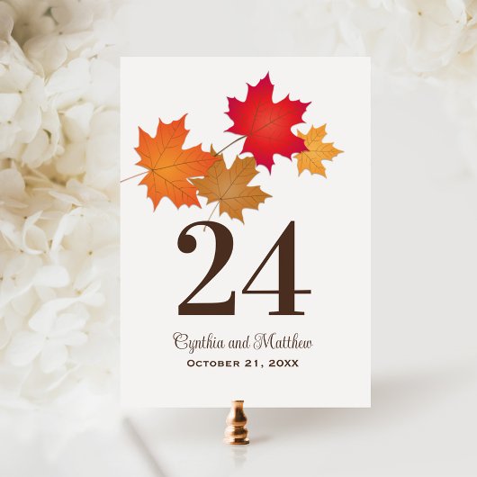Numéro de table de mariage élégant avec feuilles d