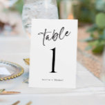 Numéro De Table Décontracté de divertissement simple Numéro de tab<br><div class="desc">Numéros de table Mariage simples et modernes : Utilisez ces numéros de table d'écriture moderne à votre mariage ou événement. Ce design comporte le mot "Table" dans un script d'écriture amusant et désordonné. Il est en noir, mais vous pouvez changer la couleur à tout ce que vous voulez! Cliquez simplement...</div>