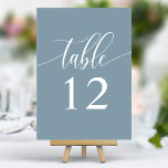 Numéro De Table Dusty Mariage de calligraphie minimaliste bleu<br><div class="desc">Améliorez votre réception de mariage avec une élégance sobre. Ces numéros minimalistes de table comportent un seul mot, "Table", dans un script de calligraphie délicat sur un arrière - plan bleu poussiéreux apaisant. Le design simple et raffiné ajoute une touche de sophistication à votre cadre de table, permettant à vos...</div>