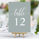 Numéro De Table Dusty Sage Minimaliste Mariage de calligraphie<br><div class="desc">Améliorez votre réception de mariage avec une élégance sobre. Ces numéros minimalistes de table comportent un seul mot, "Table", dans un script de calligraphie délicat sur un arrière - plan de sage poussiéreux apaisant. Le design simple et raffiné ajoute une touche de sophistication à votre cadre de table, permettant à...</div>