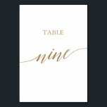 Numéro De Table Élégante calligraphie Or Tableau Neuf Numéro de ta<br><div class="desc">Cette élégante calligraphie dorée table numéro neuf table est parfaite pour un mariage simple. Le design neutre présente une carte minimaliste décorée avec une typographie romantique et fantaisiste de feuille d'or. La carte s'imprime à l'avant et à l'arrière (double face). Les autres numéros de tableau de la collection sont vendus...</div>