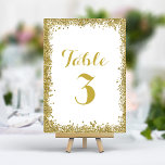 Numéro De Table Mariage Parties scintillant Gold Confetti<br><div class="desc">Ajoutez une touche de glamour et d'éclat à votre réception de mariage avec ces élégants numéros de table. Avec un cadre de confettis doré chatoyant sur un arrière - plan blanc immaculé, ces cartes créent un look moderne et festif. Personnalisez facilement vos numéros de table pour un cadre de table...</div>