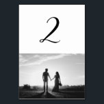 Numéro De Table Mariage photo en noir et blanc Numéro de tableau<br><div class="desc">Un magnifique script de calligraphie blanc et noir présentant la photo du couple. Un design photo mariage moderne avec des éléments minimalistes simples. Un design de numéro de table moderne mariage idéal pour toute personne qui aime la calligraphie script, les conceptions noir et blanc et la papeterie photo mariage. Des...</div>