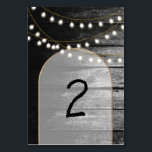 Numéro De Table Moderne Rustique Noir Bois Lumière Arc Mariage<br><div class="desc">Une belle fusion de bois rustique combiné à l'or chic moderne, lumières élégantes et arche. Un design unique qui utilise les tons noir et blanc avec une touche d'or élégant. Un design de grange de campagne rencontre le glamour de la ville. Conception de numéro de table de mariage rustique avec...</div>