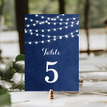 Numéro De Table Numéro de tableau du Mariage de la Marine<br><div class="desc">Design chic moderne de carte de numéro de table mariage d'été avec des lampes à cordes élégantes et simples accrochées sur le dessus et un mélange classe de polices de script modernes et de calligraphie sur un arrière - plan imprimé fausse aquarelle texture. Un design simple et élégant, parfait pour...</div>