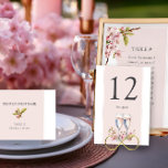 Numéro De Table Réception de mariage Cherry Blossom<br><div class="desc">Numéro de table du mariage Cherry Blossom avec texte personnalisé en option. Un beau design rose et blanc doux, orné de délicates fleurs de cerisier d'aquarelle et de verres de champagne, donnant une atmosphère gracieuse et botanique à votre célébration. Le design donne le ton pour une journée romantique et inoubliable...</div>