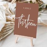 Numéro De Table Table avec script à main rouille TREIZE<br><div class="desc">Cartes numériques simples et chic en couleur terre rouille brun et blanc faire une déclaration élégante à votre mariage ou événement. Le design comporte "table [nombre]" dans un mélange de sérigraphie classique et de lettres manuscrites. Le design se répète de part et d'autre. Cartes numérotées individuellement vendues séparément; commandez chaque...</div>