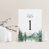 Numéros de table de mariage au bord d'un lac de mo
