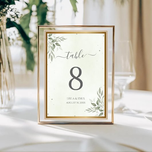Numéros de table de mariage avec feuillage de saug
