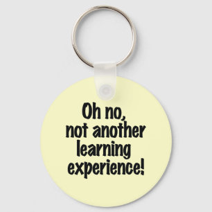 O nee niet weer een leerervaring sleutelhanger