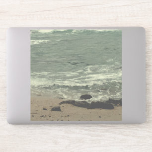 oceaangolven en strand sticker