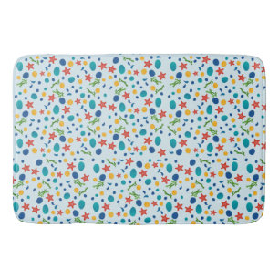 Oceaanstrand met zeesterren, schelpen en steentjes badmat