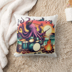 Octopus speelt drums bij het strand bij zonsonderg kussen