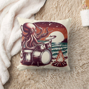 Octopus speelt drums bij kampvuur bij zonsondergan kussen