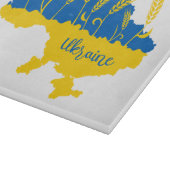 Oekraïense typografie en tarweoor onder Oekraïense Snijplank (Hoek)