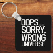 Oeps, sorry, verkeerde wereld sleutelhanger (Voorkant)