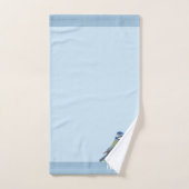 Oiseau mignon moderne sur fond bleu clair (Serviette à main)