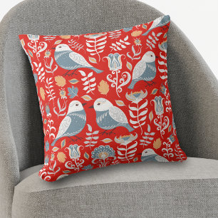 Oiseau nordique bleu sur oreiller Motif rouge