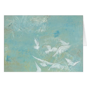Oiseaux blancs volant par le ciel bleu
