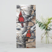 Oiseaux cardinaux rouges perchés sur une carte de  (Debout devant)