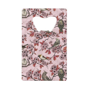 Oiseaux et fleurs de cerisier sur fond rose saumon