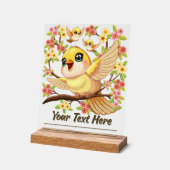 Oiseaux mignons et heureux parmi les fleurs du pri (Angle)