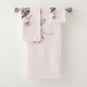 Oiseaux roses et noirs sur une branche d'arbre (En situation)