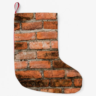 Old and vintage red brick wall texture backgrounda kleine kerstsok
