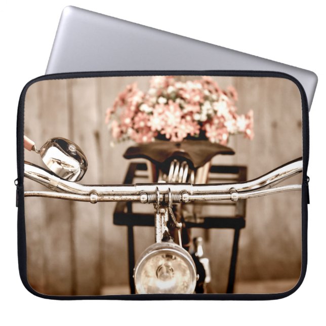 Old bicycle and flowers blur in background process laptop sleeve (Voorkant)