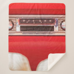 Old car radio inside a red classic American car wi Sherpa Deken