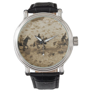 Old West Cowboys Riding Horloge