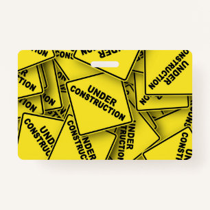 Onder constructietekens badge