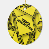 Onder constructietekens keramisch ornament (Links)