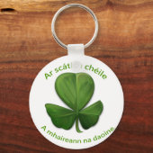 Onder het onderdak van elkaar overleven mensen sleutelhanger (Voorkant)