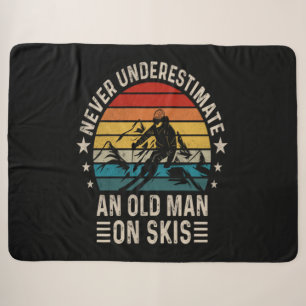 Onderschat nooit een oude man op skis Retro Sherpa Deken