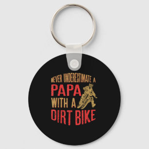 Onderschat nooit een pap met een vuile bike grappn sleutelhanger