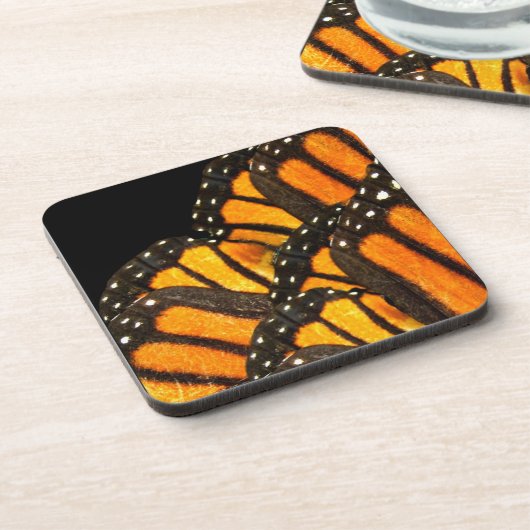 onderzetter monboogvlinder tegen zwarte vleugels (Linkerzijde)